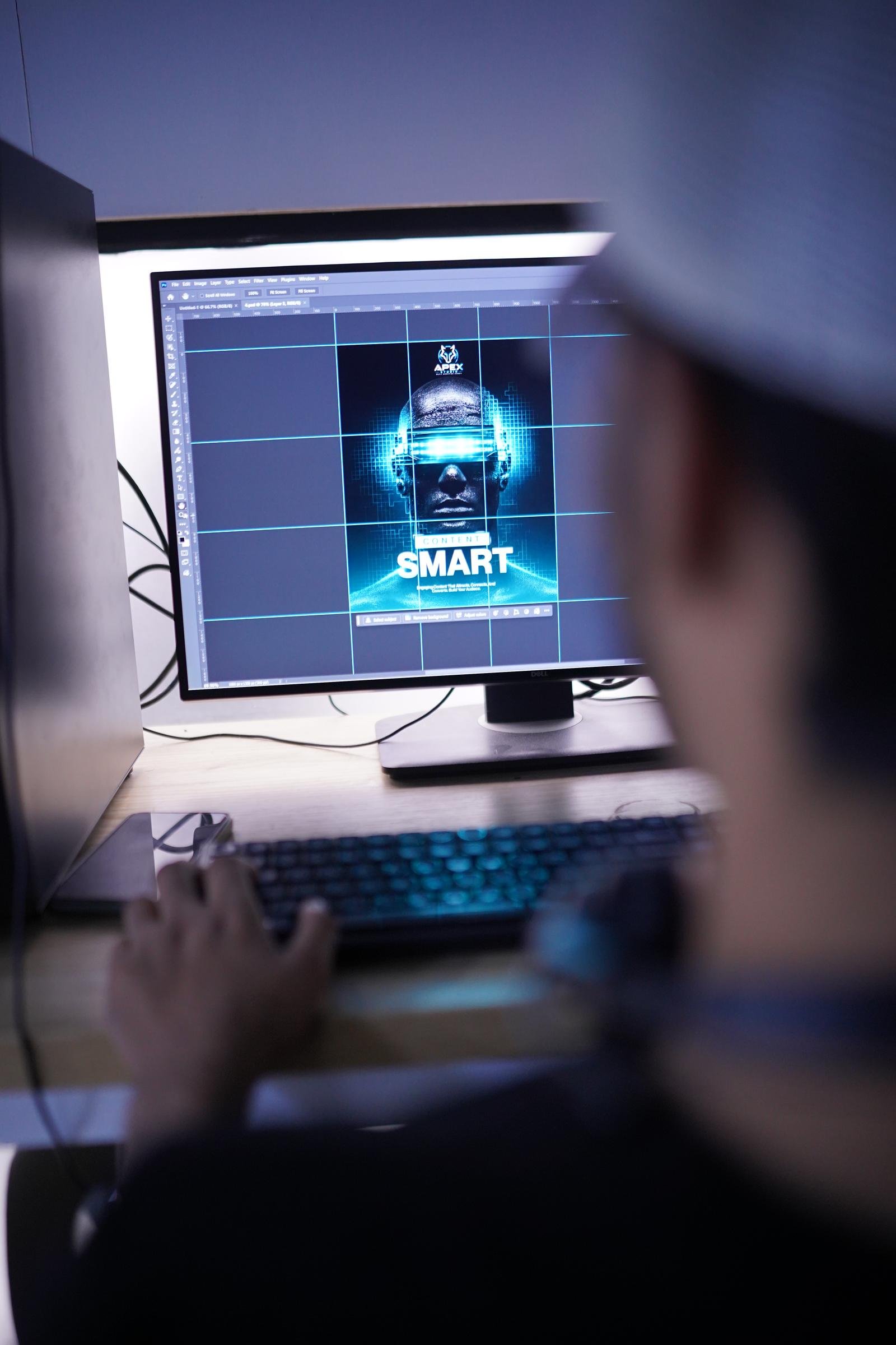 A WorkX member working at the design corner near the podcast studio