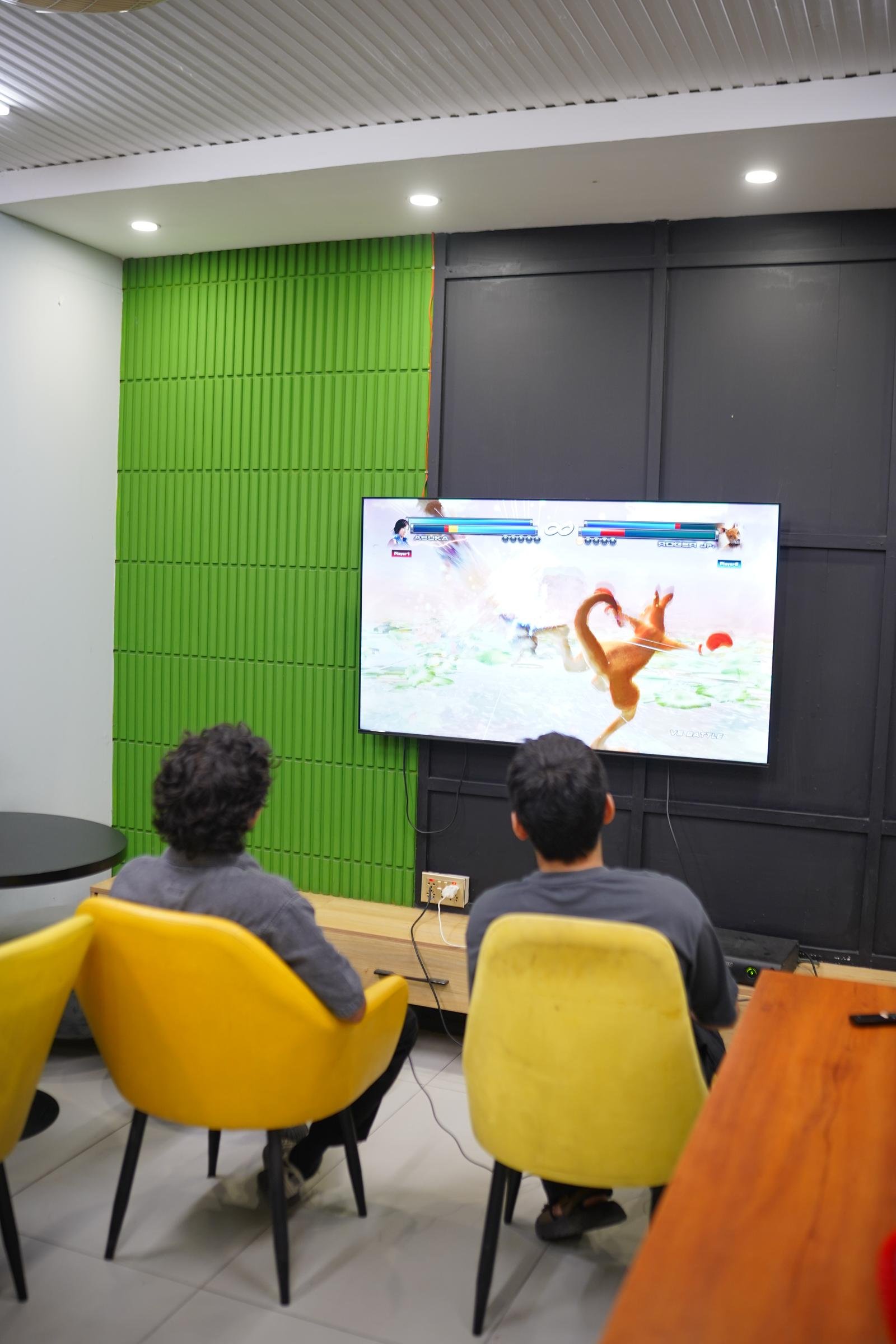 WorkX members relaxing in the gaming lounge between work sessions